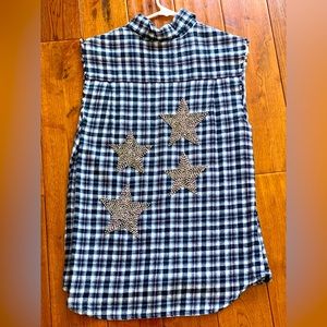 NWOT Sleeveless flannel with silver beaded stars in the back.
